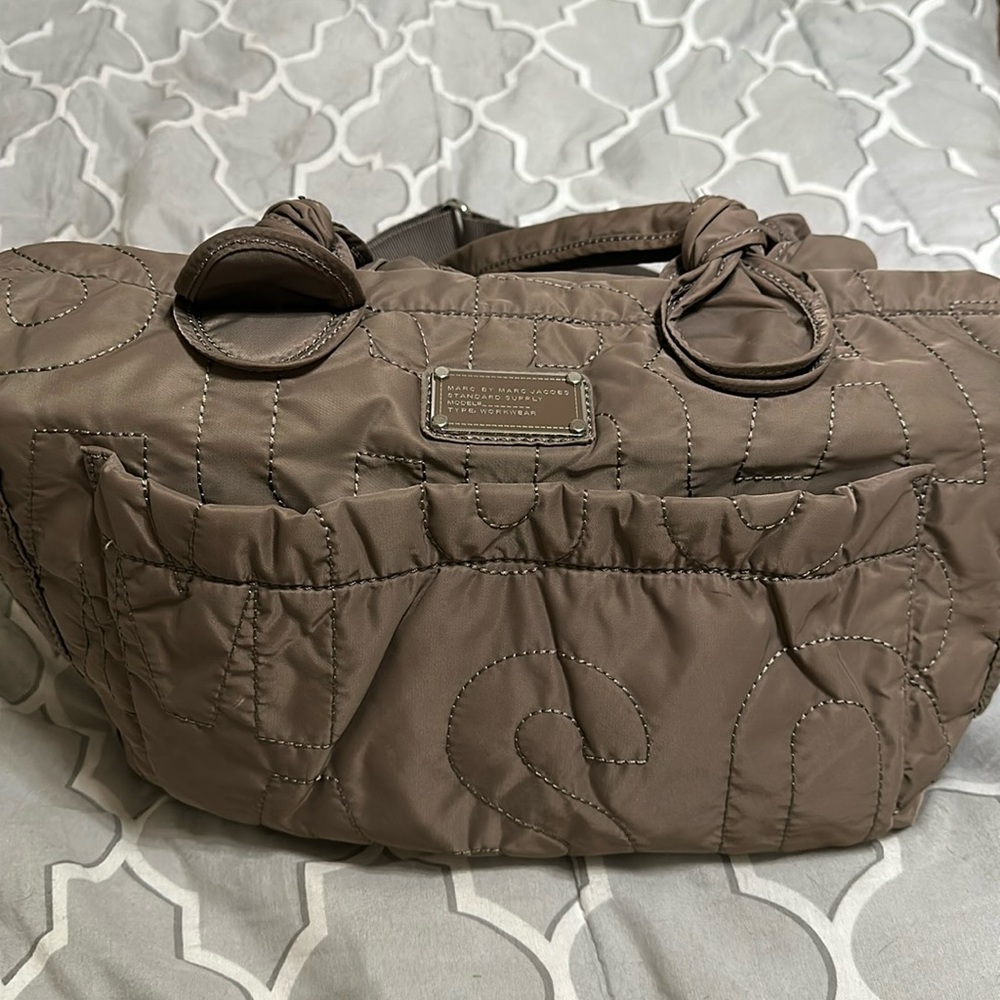 Marc Jacob’s chestnut colored quilted diaper bag.